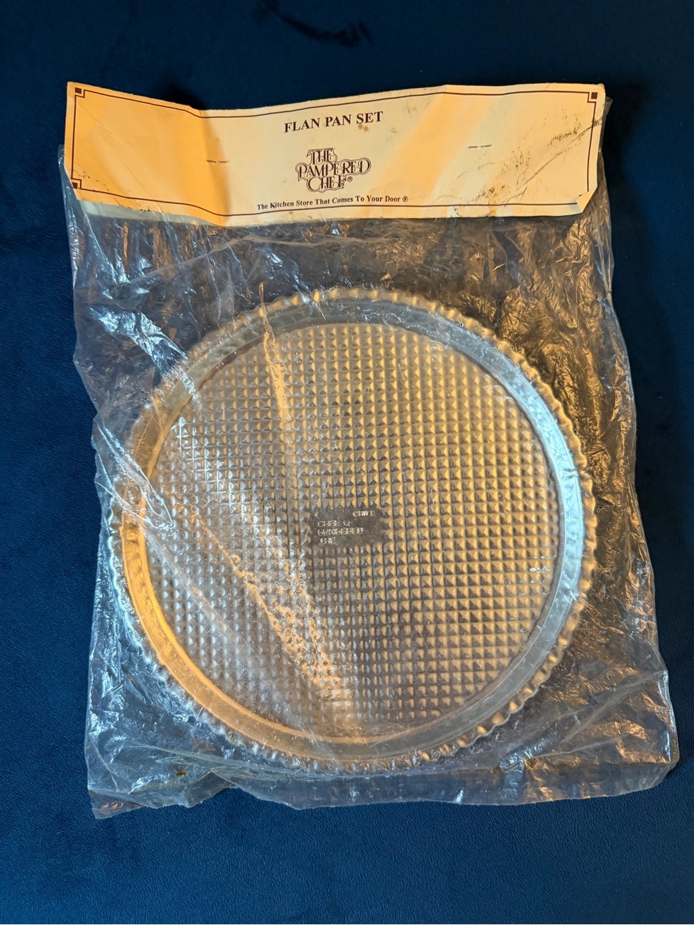 New in package Pampered Chef flan set